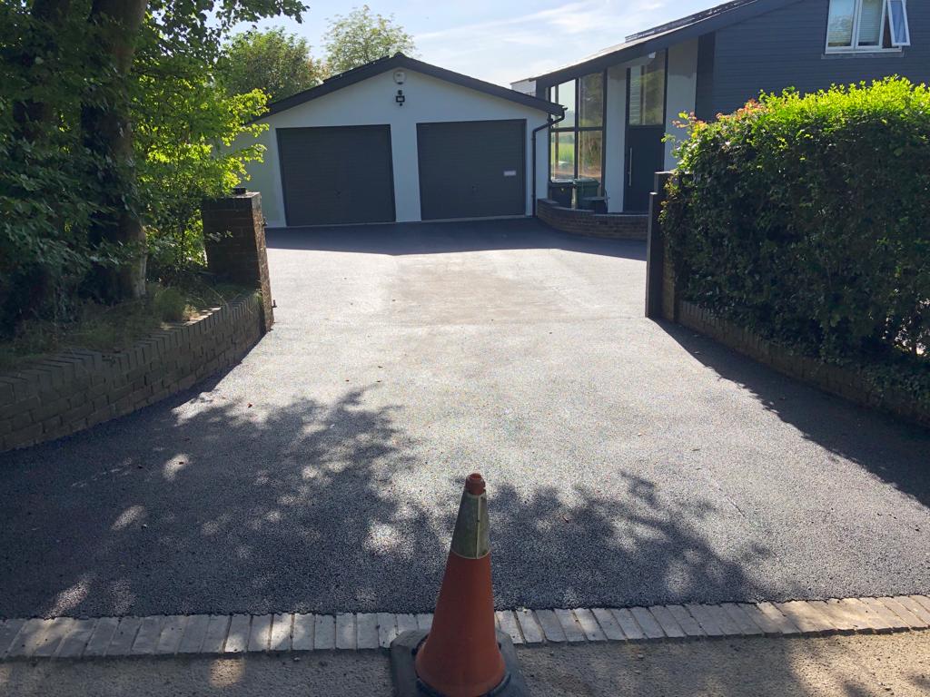 This is a photo of a bitumen driveway which is in the process of being installed by Doncaster Road Tech