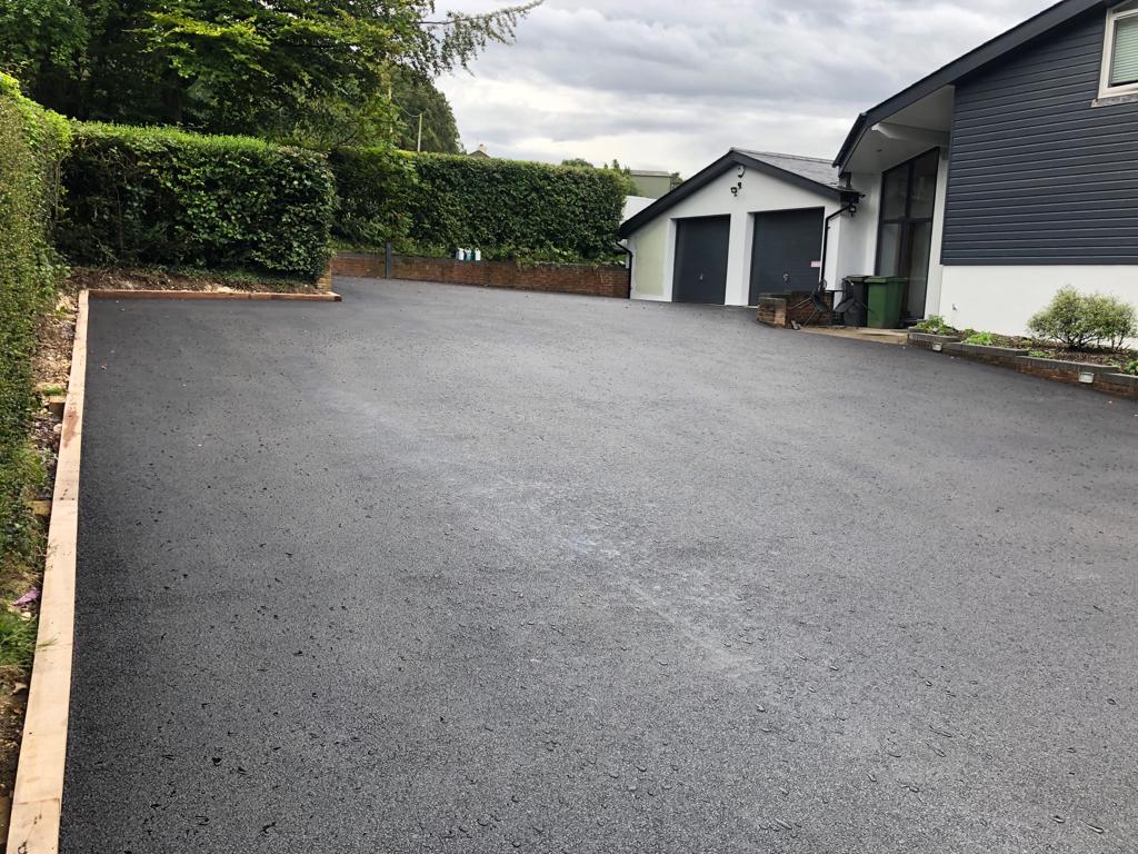 This is a photo of a asphalt driveway which is in the process of being installed by Doncaster Road Tech