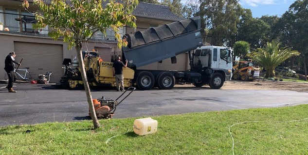 This is a photo of an asphalt driveway which is in the process of being installed by Doncaster Road Tech